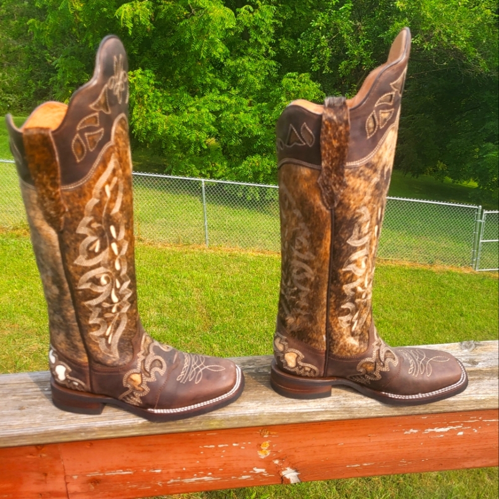 Lacy tall cowboy boots  size 7, calf size  15.5. Brindle hair & brown leather.